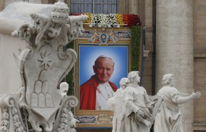 Banner depicting St. John Paul II hangs at Vatican