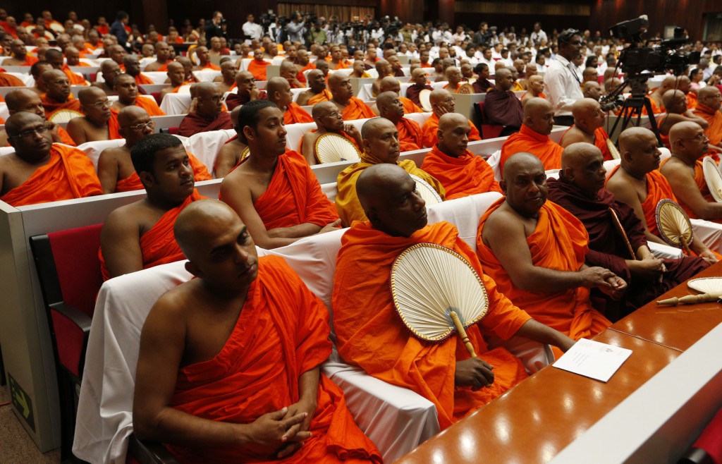Buddhist monks attend Pope Francis' meeting with religious leaders in Colombo, Sri Lanka