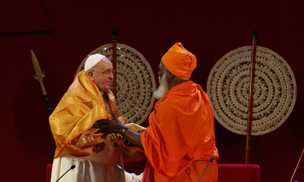 Pope Francis receives robe during meeting with religious leaders in Colombo, Sri Lanka