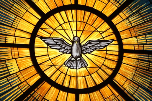 The Holy Spirit, traditionally depicted as a dove, is pictured in a stained-glass window at St. John Vianney Church in Lithia Springs, Ga. The feast of Pentecost, marking the descent of the Holy Spirit upon the apostles, is May 24 this year. (CNS photo/Michael Alexander, Georgia Bulletin)