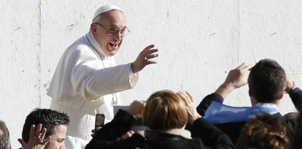 Pope Francis greets people before celebrating inaugural Mass in St. Peter's Square at Vatican