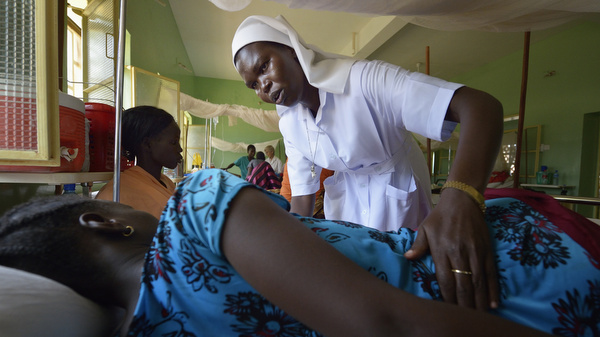 Nun comforts patient in South Sudan