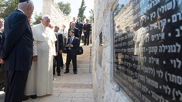 Pope Francis visits a memorial at Mount Herzl in Jerusalem May 26. Theodor Herzl was the father of the Zionist movement that led to Israel's founding. (CNS photo/ OSSERVATORE ROMANO handout, EPA) 