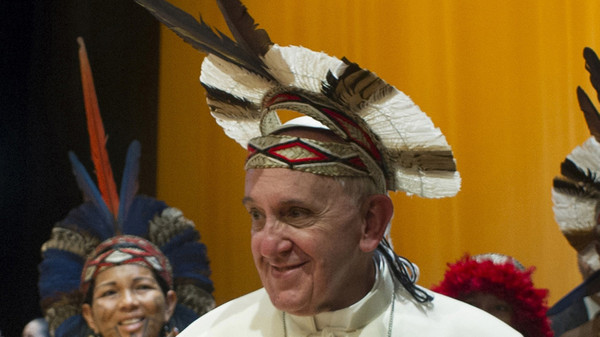 Pope wears Indian headdress presented by members of native tribe of Brazil