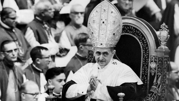 Pope Paul VI makes his way past bishops during session of Second Vatican Council