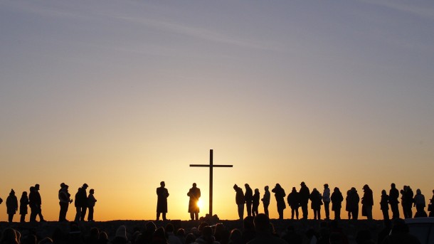 Sun rises as people gather for ecumenical Easter service in Massachusetts