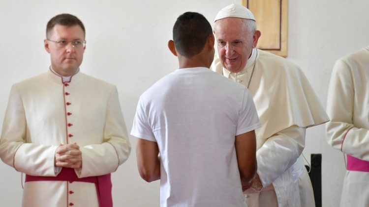 Pope Francis greets an inmate at the Pacora Juvenile Detention Center (Vatican Media)