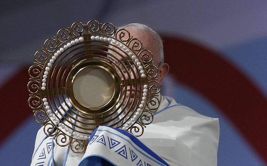Pope Francis blesses the crowd with the monstrance during the World Youth Day prayer vigil at St. John Paul II Field in Panama City Jan. 26, 2019. (CNS photo/Paul Haring)