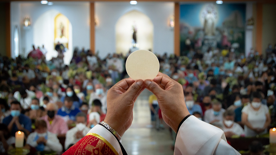 Who do I receive the Eucharist for?
