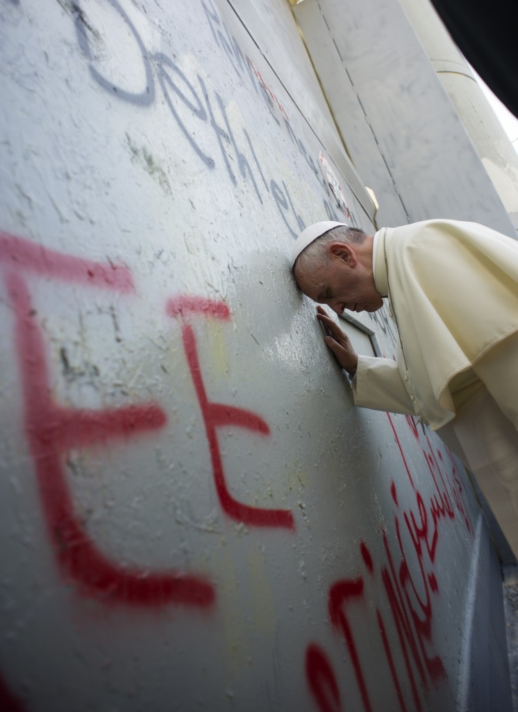 Pope Francis stops in front of the Israeli security wall in Bethlehem, West Bank