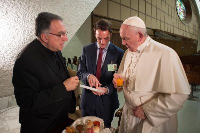 Sebastian Gomes and Fr. Thomas Rosica introduce Pope Francis to “The Francis Effect” documentary.